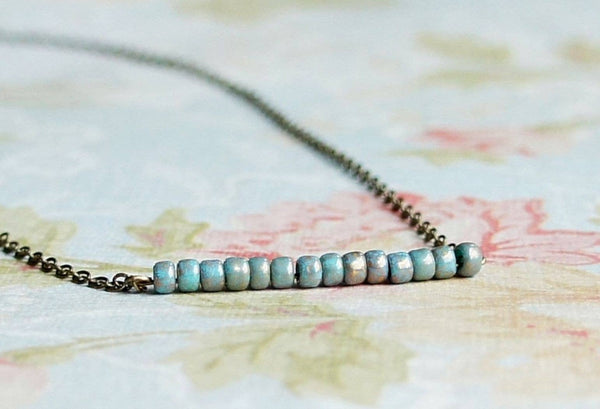 Sentimento - Gilded Turquoise Blue Beaded Bar Necklace
