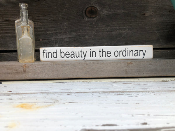 Find beauty in the ordinary wood sign
