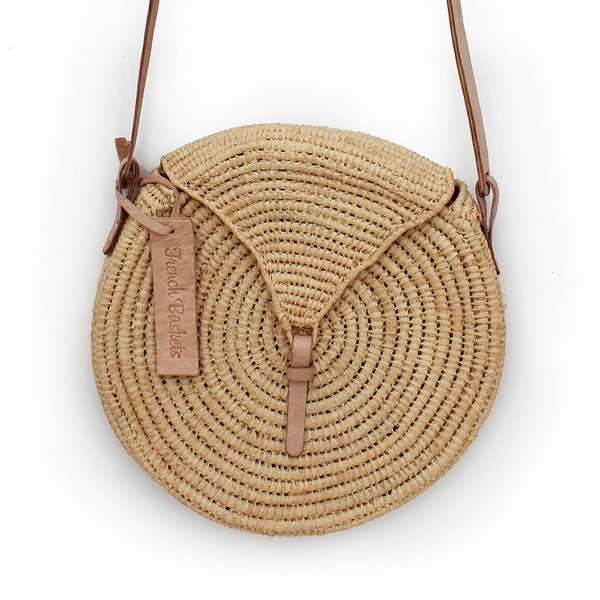Small round natural straw bag